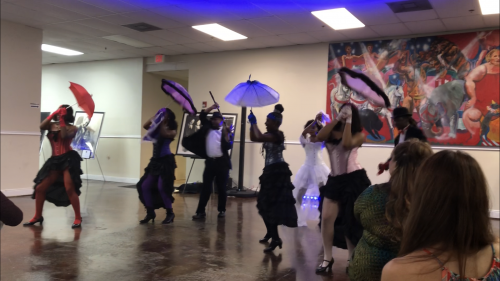 Performers Dancing with Second Line Umbrellas